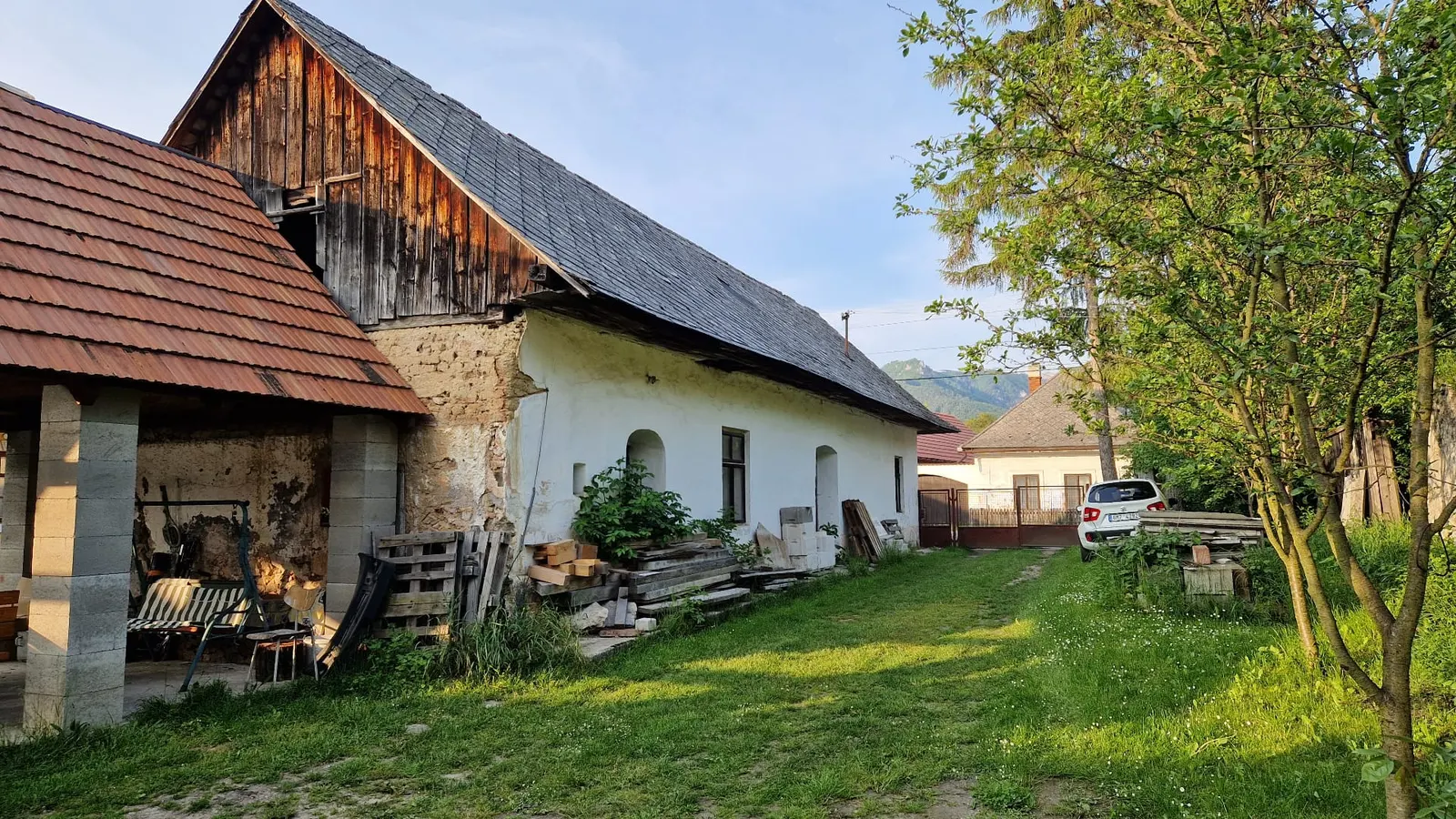 Inner courtyard with Veľká Fatra view — before / after — After